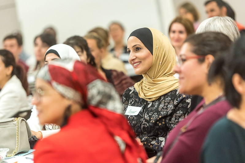 Immigrant women in a community event